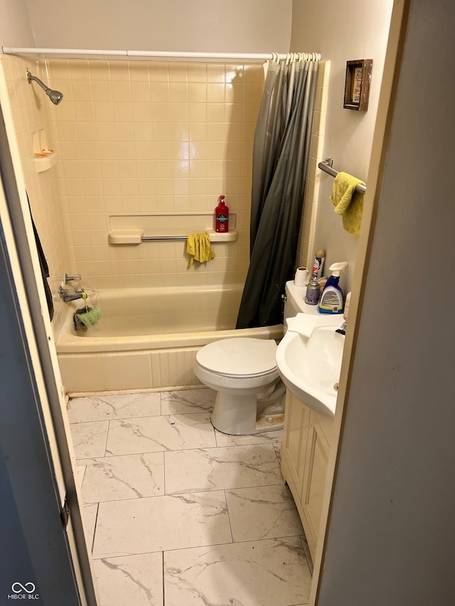 full bathroom with vanity, toilet, and shower / bath combo