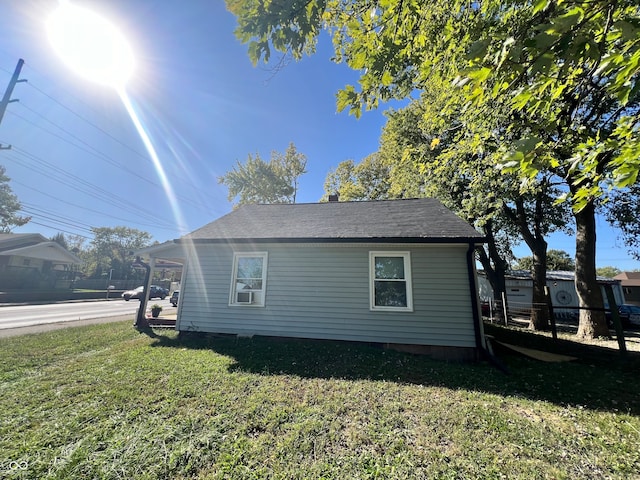 view of home's exterior featuring a lawn