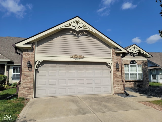 single story home featuring a garage