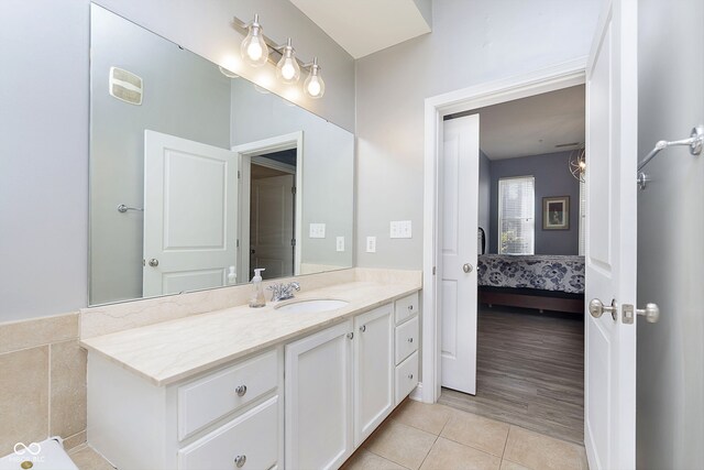 bathroom featuring vanity and hardwood / wood-style flooring