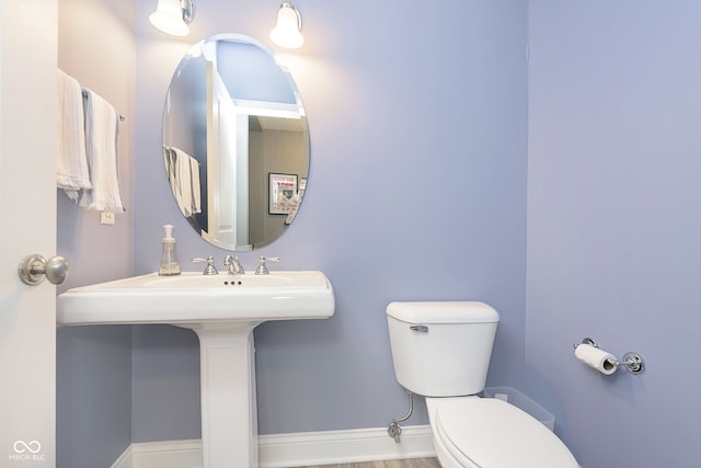 bathroom with toilet and sink