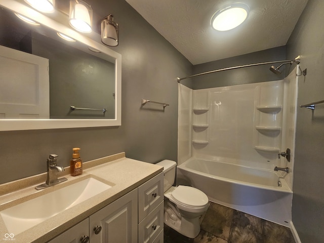 full bathroom with bathtub / shower combination, vanity, toilet, and a textured ceiling