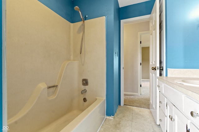 bathroom featuring vanity, shower / bathtub combination, and tile patterned floors