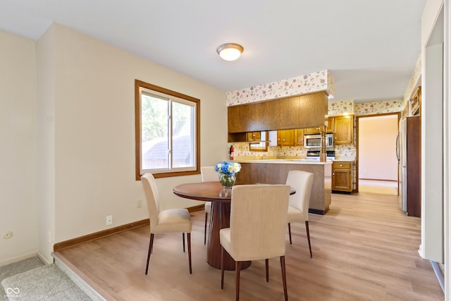 dining area featuring light hardwood / wood-style floors