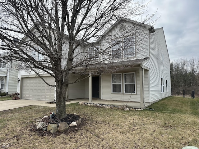 view of front property with a front yard and a garage