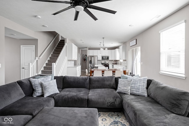 living room with ceiling fan