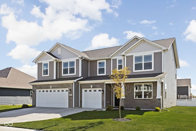 view of front of home featuring a garage and a front lawn