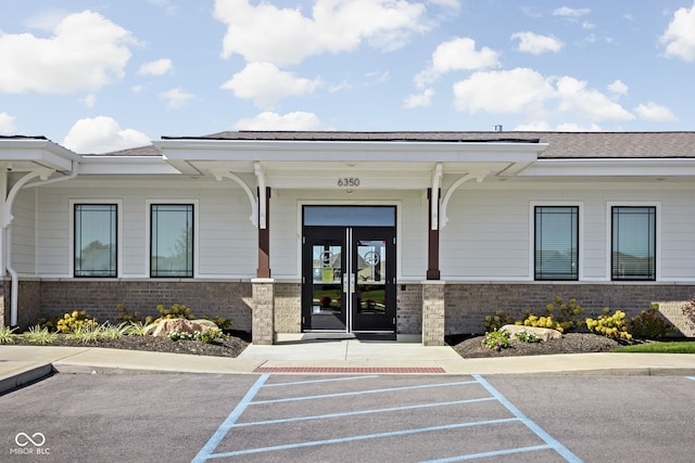 view of exterior entry with french doors