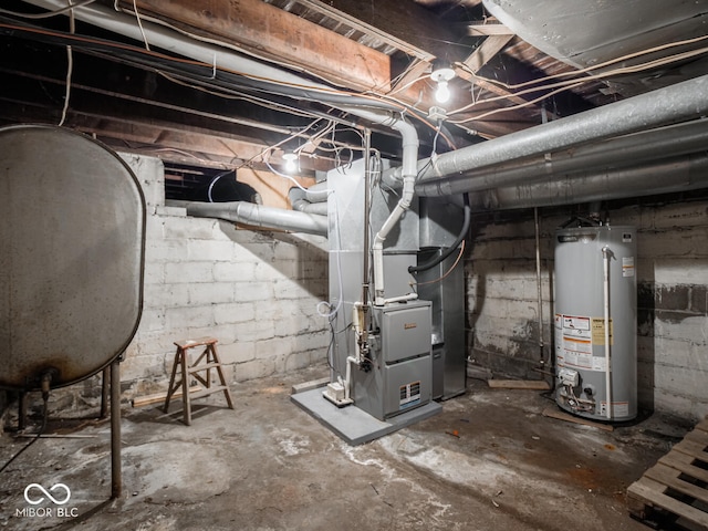 basement featuring heating unit and water heater