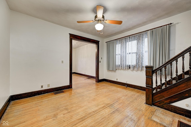 interior space featuring ceiling fan and light hardwood / wood-style flooring