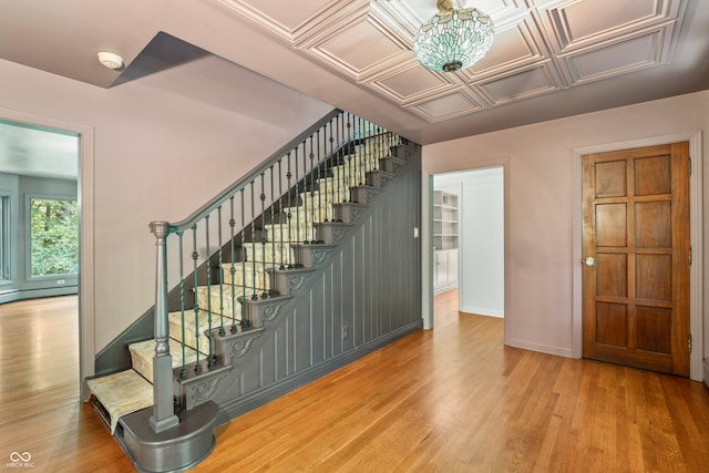 stairway featuring hardwood / wood-style floors