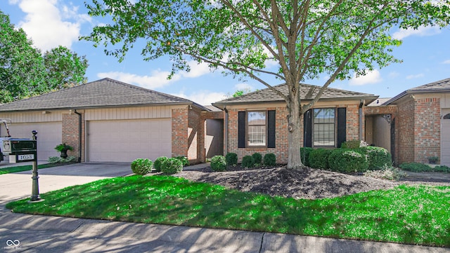 single story home featuring a garage