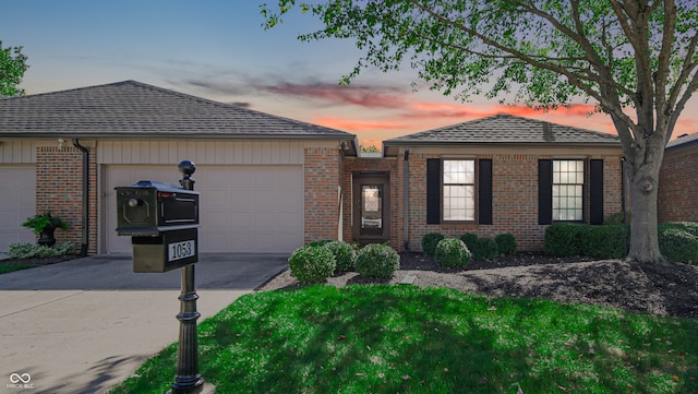 ranch-style home with a garage