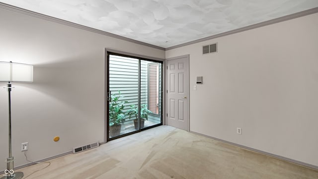 unfurnished room with light colored carpet and ornamental molding