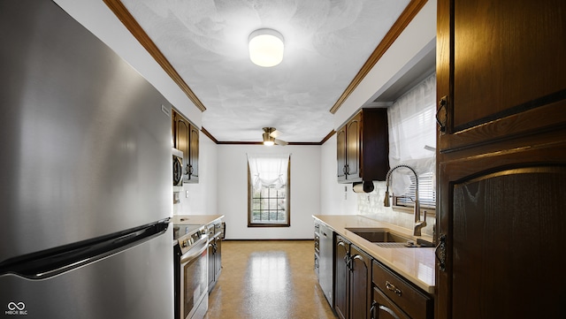 kitchen with dark brown cabinetry, sink, crown molding, appliances with stainless steel finishes, and a textured ceiling