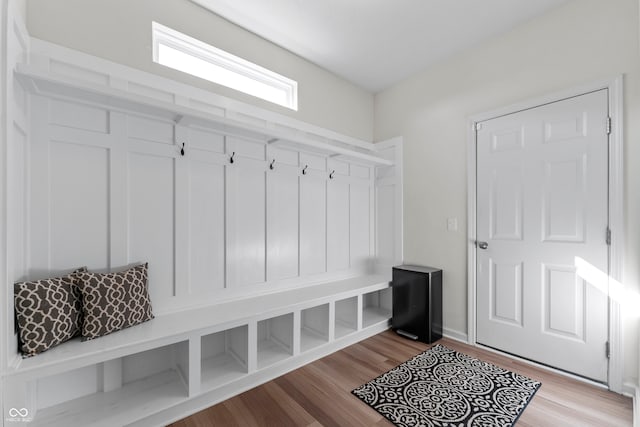 mudroom with light hardwood / wood-style floors