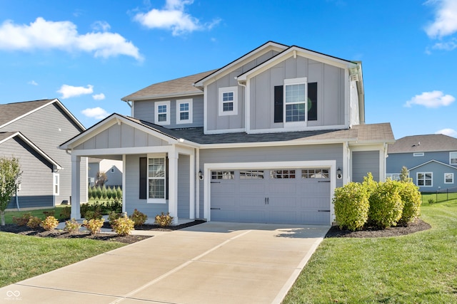 view of front facade featuring a garage and a front lawn