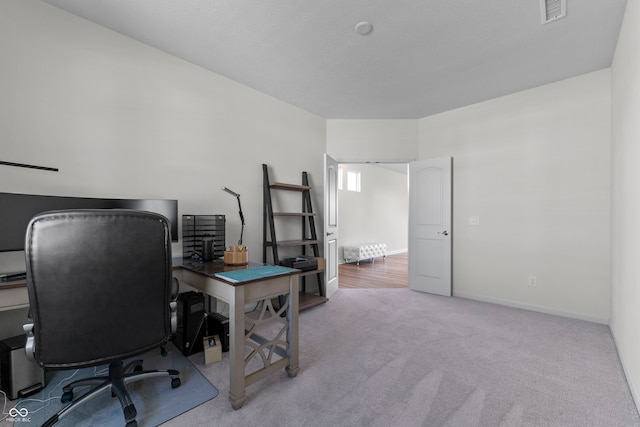 view of carpeted office space