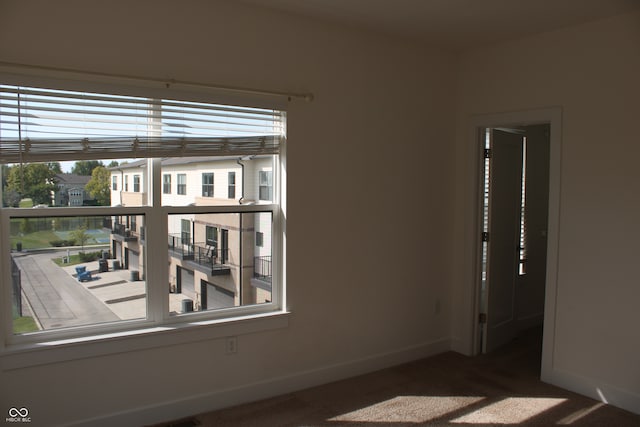 view of carpeted spare room