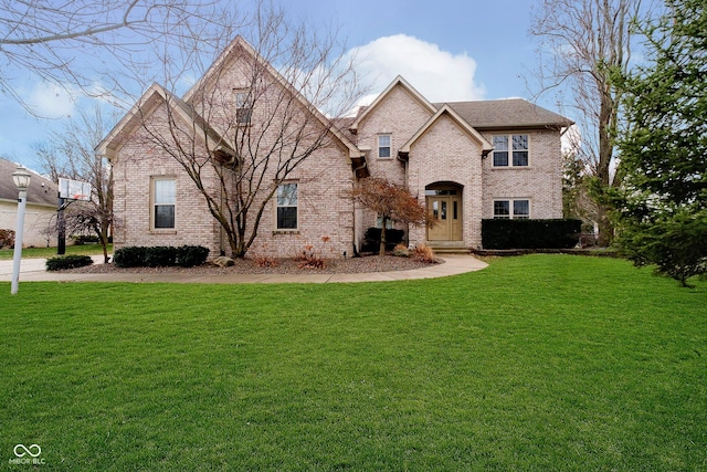 view of front of home with a front lawn