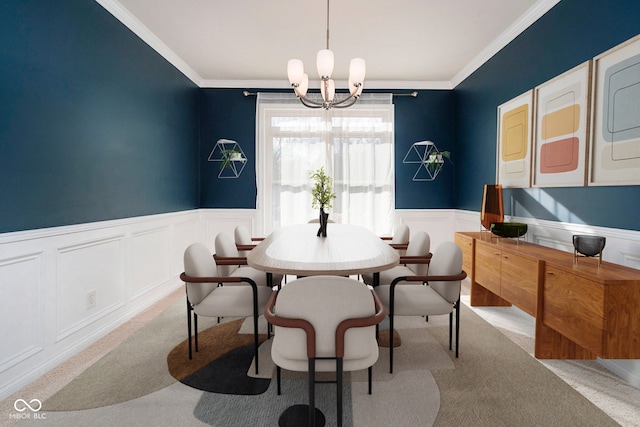 dining area featuring light carpet, ornamental molding, and an inviting chandelier