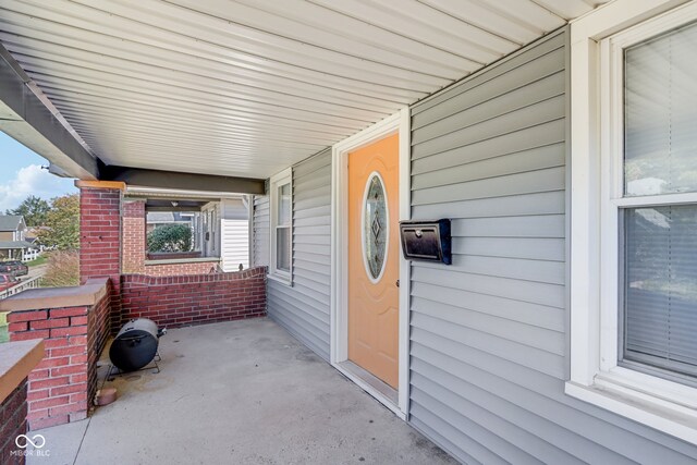 view of patio featuring a porch