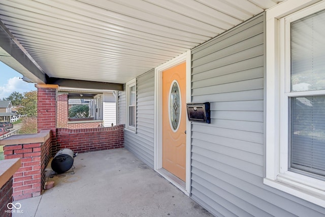 view of patio featuring a porch