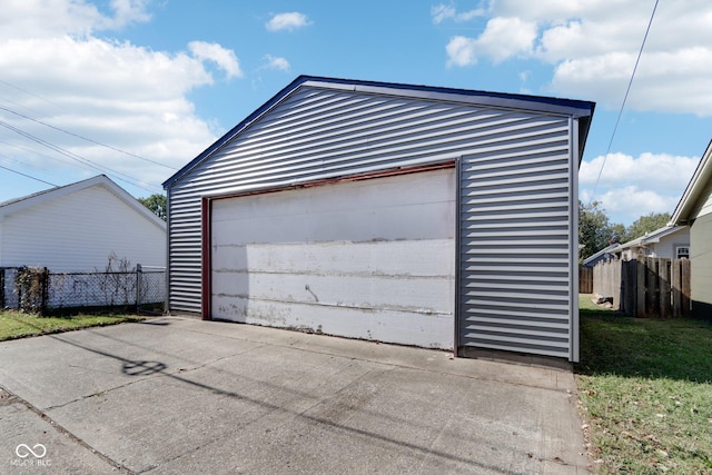detached garage with fence
