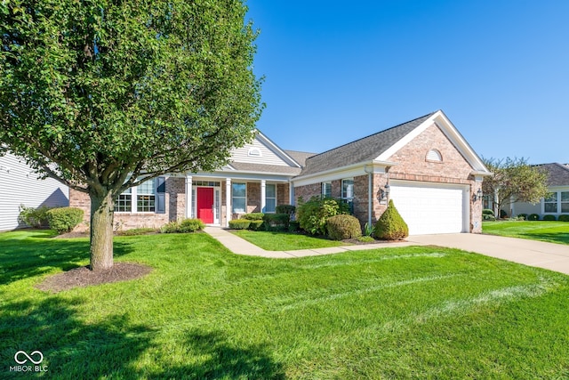 view of front of property with a garage and a front yard