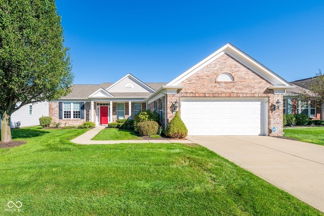 view of front of house with a garage and a front lawn