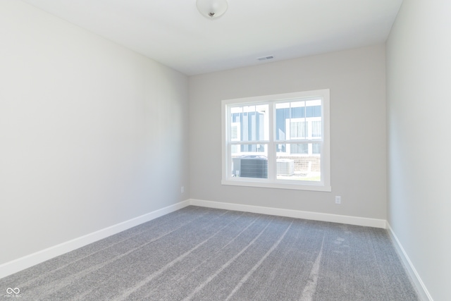 unfurnished room with carpet flooring