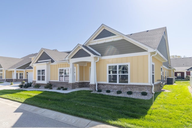 4435 W Preserve Pass, New Palestine, IN 46163 - craftsman house featuring board and batten siding, brick siding, central AC, and a front lawn