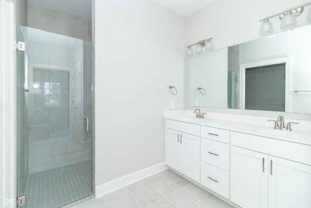 bathroom with vanity, tile patterned floors, and an enclosed shower