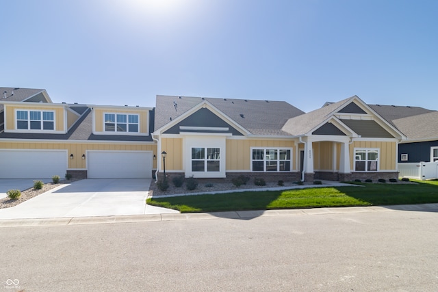 craftsman inspired home with a garage