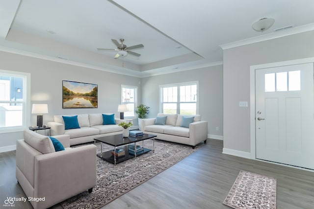 4435 W Preserve Pass, New Palestine, IN 46163 - living room with a tray ceiling, a ceiling fan, wood finished floors, baseboards, and crown molding