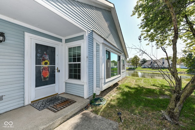 property entrance with a water view