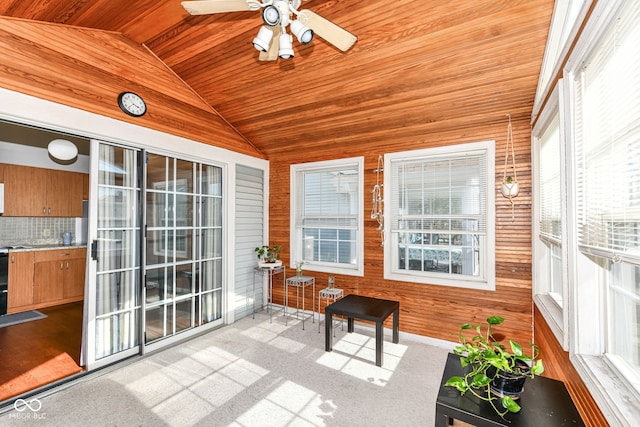 sunroom with a ceiling fan