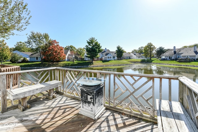 deck featuring a water view