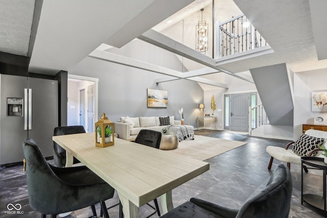 dining space featuring a chandelier