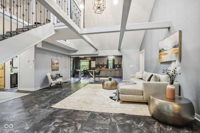 living room featuring vaulted ceiling with beams