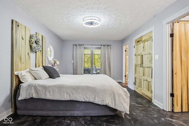 bedroom with a textured ceiling