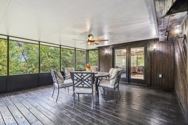 sunroom / solarium with ceiling fan