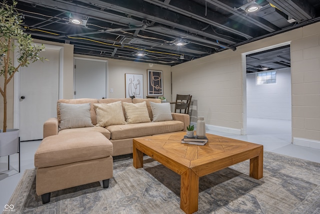 living room featuring concrete flooring