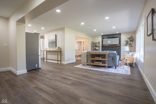 bar featuring dark hardwood / wood-style flooring