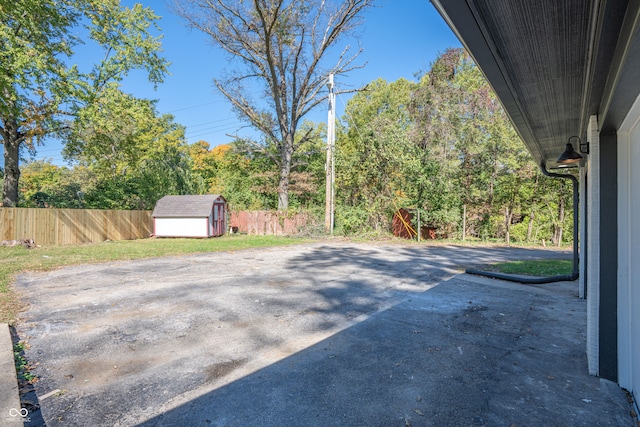 view of patio / terrace with a storage unit