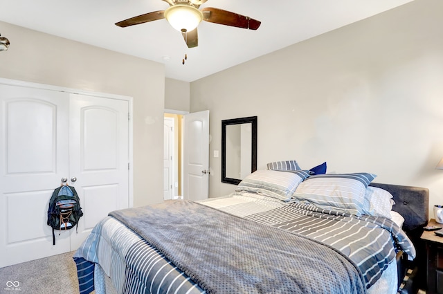 bedroom featuring carpet, a closet, and ceiling fan