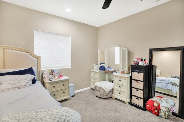 bedroom with light colored carpet and ceiling fan