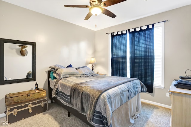 bedroom featuring ceiling fan and carpet flooring