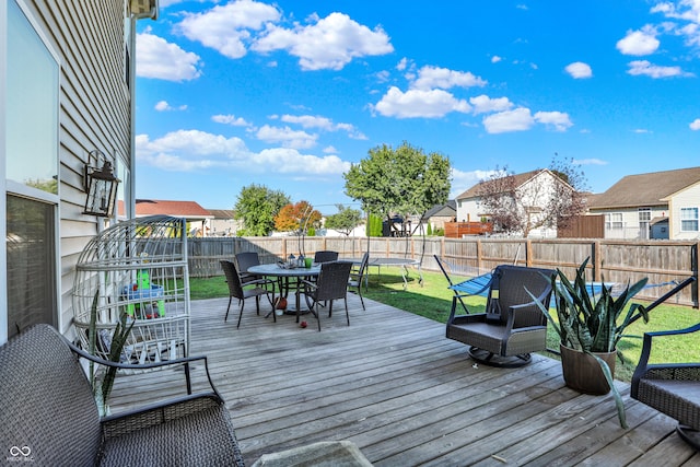 deck featuring a lawn