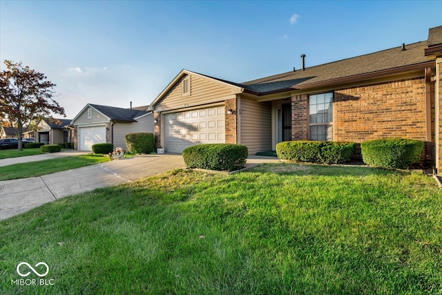 ranch-style home featuring a garage and a front lawn